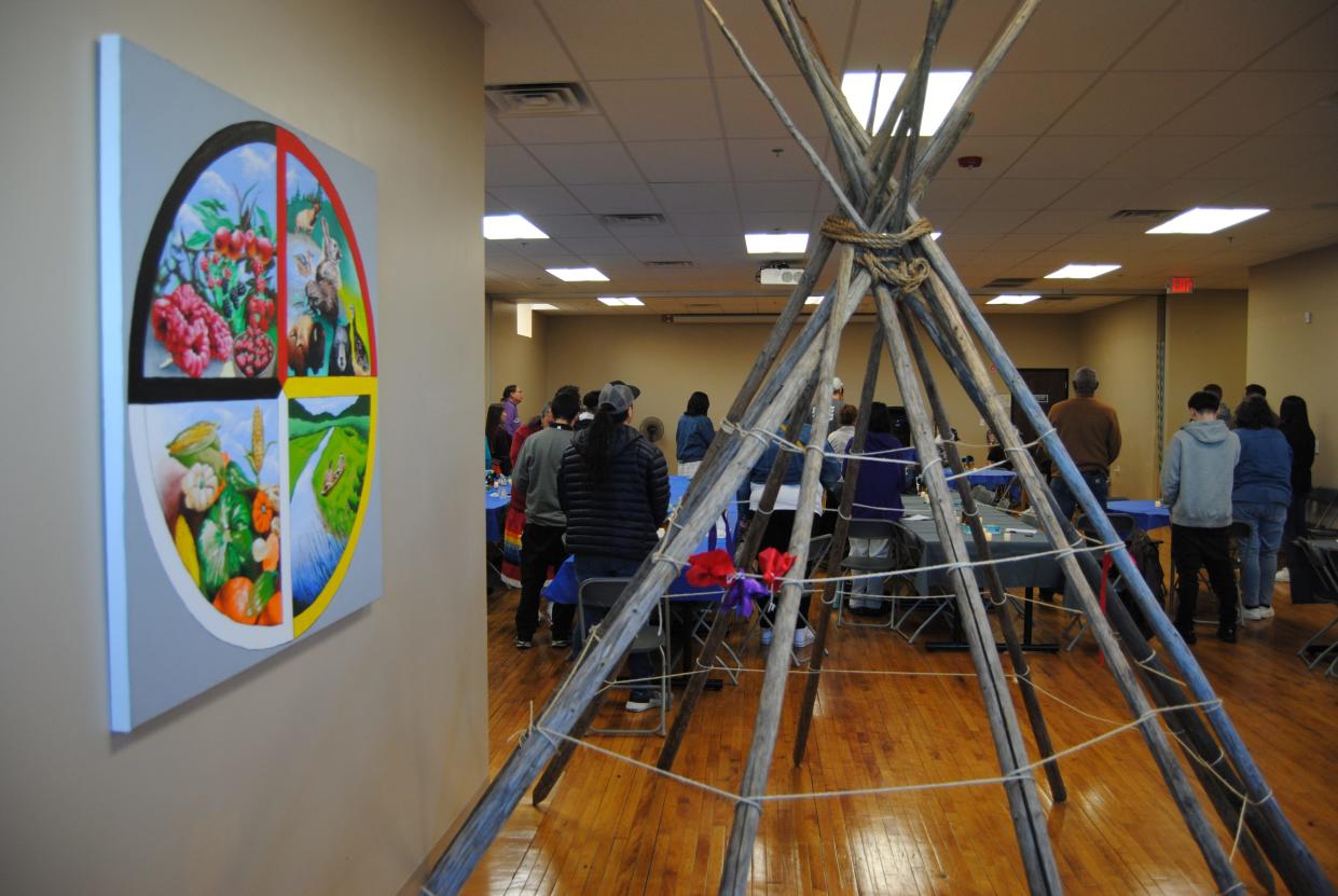 A coverless teepee is to be covered with prayer ties by those who have lost loved ones to drug overdoses during a vigil at the Gerald L. Ignace Indian Health Center in Milwaukee.