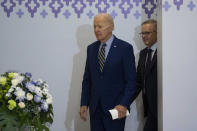 U.S. President Joe Biden, left, walks with Australian Prime Minister Anthony Albanese into a meeting during the Association of Southeast Asian Nations (ASEAN) summit, Sunday, Nov. 13, 2022, in Phnom Penh, Cambodia. (AP Photo/Alex Brandon)