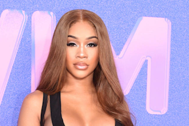 Saweetie Takes a Risk in a Lace-Up Top, Low-Rise Pants & Hidden Heels –  Footwear News