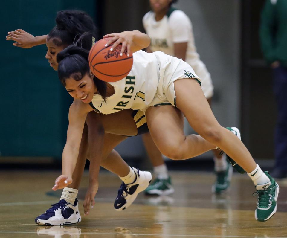 St. Vincent-St. Mary guard Jazmin Torres' all-around game lifted the Fighting Irish to a district final win over Norton.