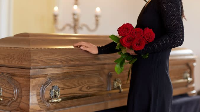 woman grieving in funeral home