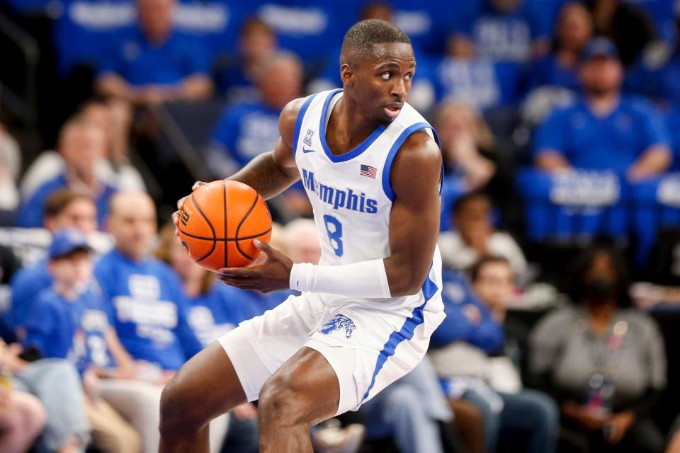 Memphis' David Jones (8) looks to pass the ball during the game between Florida Atlantic University and University of Memphis at FedExForum in Memphis, Tenn., on Sunday, February 25, 2024.