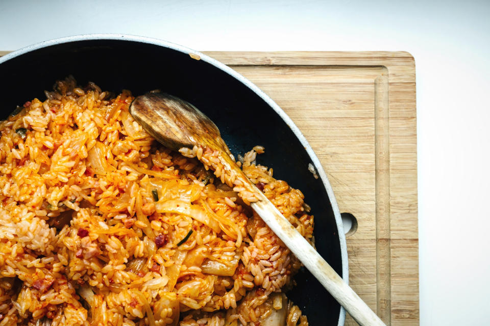 Cooking kimchi fried rice.