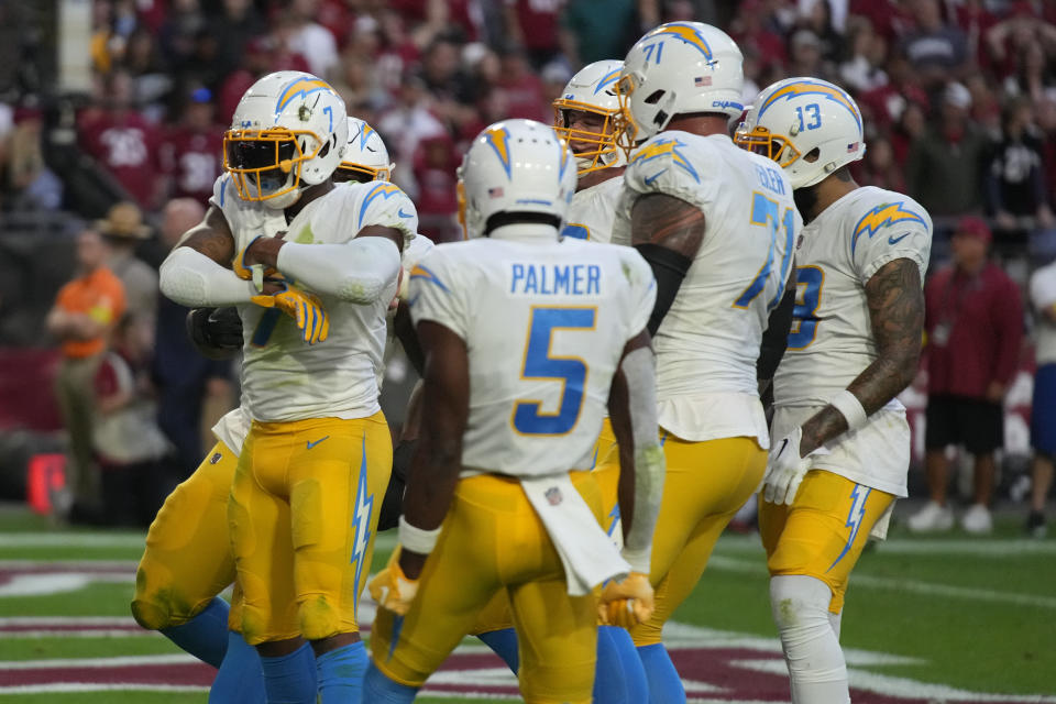 Los Angeles Chargers tight end Gerald Everett (7) celebrates his game-winning two-point conversion against the Arizona Cardinals during the second half of an NFL football game, Sunday, Nov. 27, 2022, in Glendale, Ariz. The Chargers defeated the Cardinals 25-24. (AP Photo/Rick Scuteri)