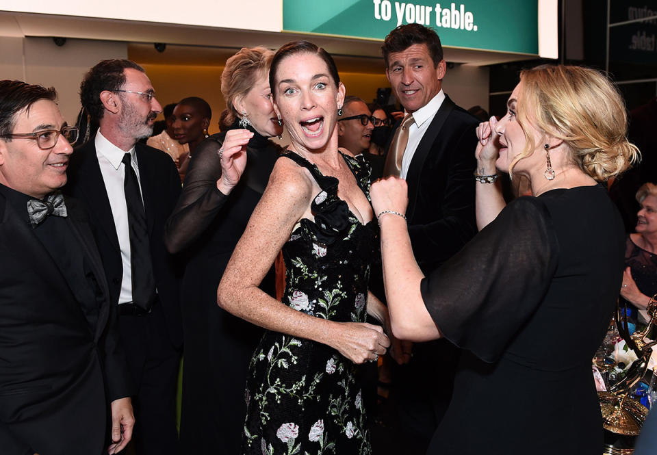 <p>Wahoo! Nicholson looked elated, with Winslet by her side. </p>