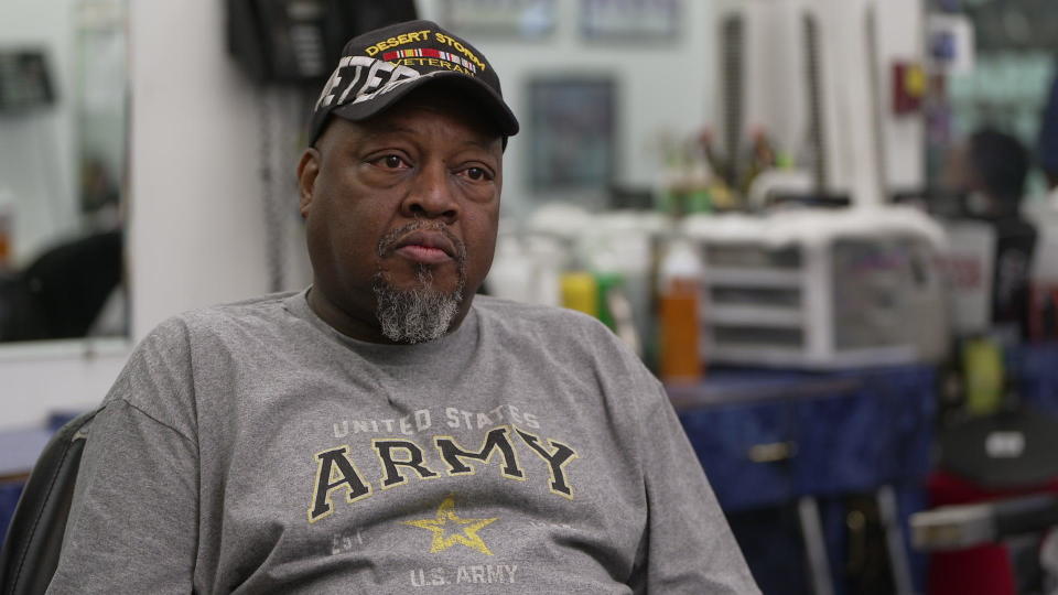 De Kalb County voter and barbershop owner James McWhorter talks with Major Garrett. / Credit: CBS News