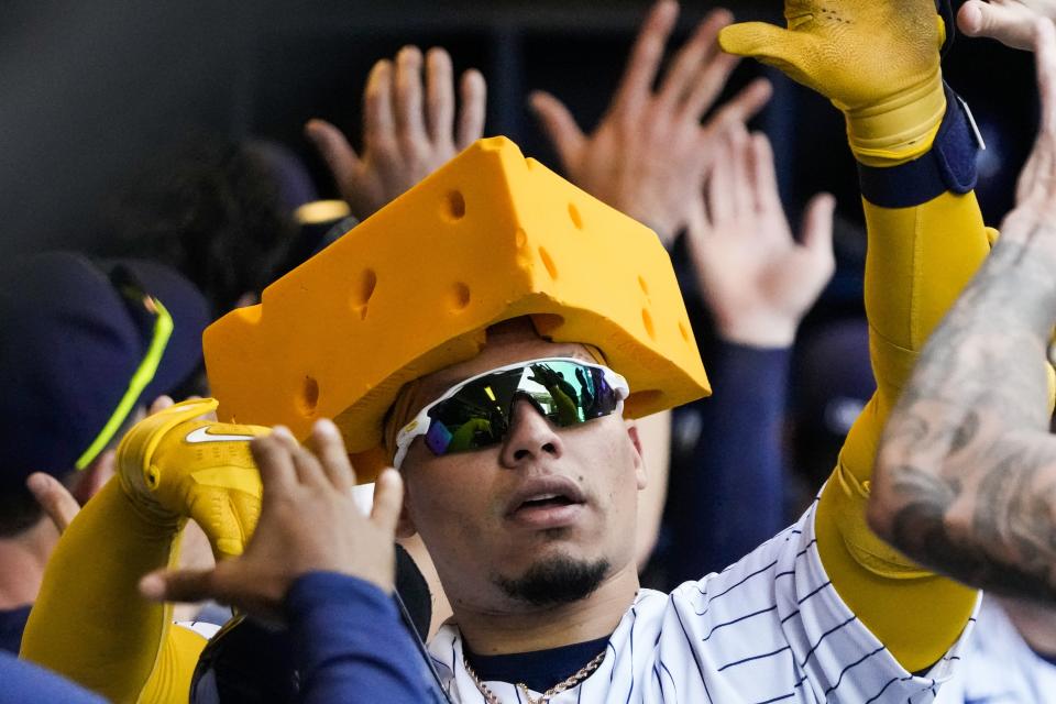 Milwaukee Brewers' William Contreras is congratulated after hitting a two-run home run during the second inning of a baseball game against the San Francisco Giants Sunday, May 28, 2023, in Milwaukee. (AP Photo/Morry Gash)