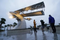 <p>A news crew sets up for a report in St. Petersburg, Florida, on Sept. 28.</p>