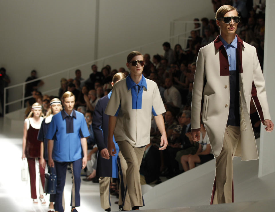 Models wear creations of Prada, from the men's Spring-Summer 2013 collection, part of the Milan Fashion Week, unveiled in Milan, Italy, Sunday, June 24, 2012. (AP Photo/Luca Bruno)