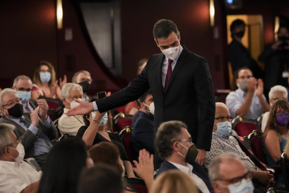 Spain's prime minister Pedro Sanchez walks out after a speech at the Gran Teatre del Liceu in Barcelona, Spain, Monday, June 21, 2021. Sanchez's said Monday that the Spanish Cabinet will approve pardons for nine separatist Catalan politicians and activists imprisoned for their roles in the 2017 push to break away from Spain. (AP Photo/Emilio Morenatti)