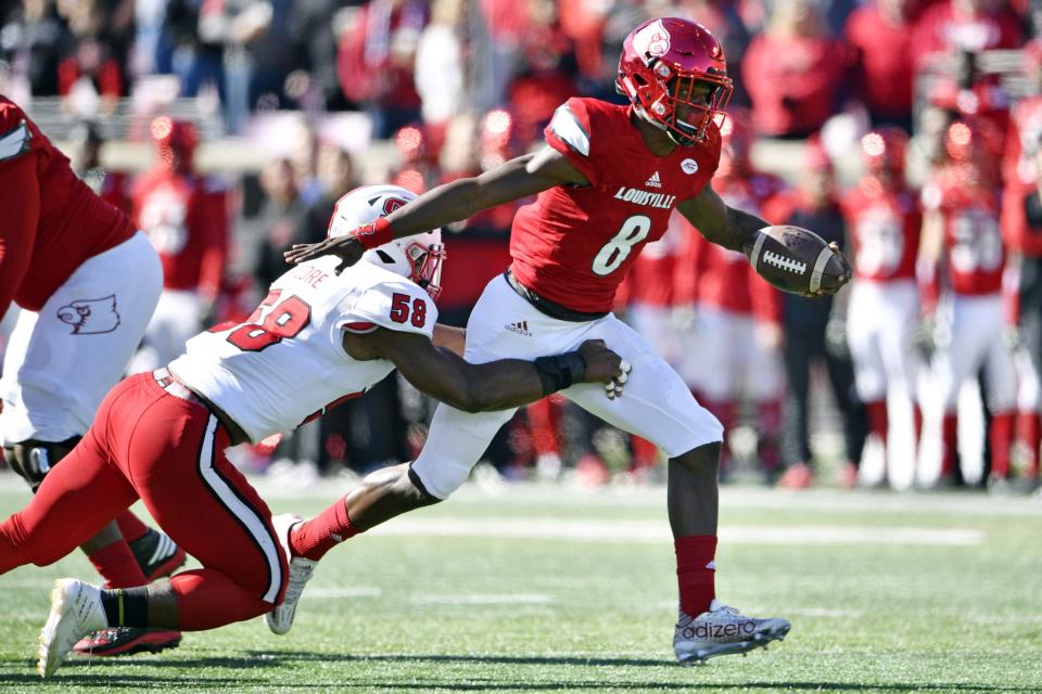 Lamar Jackson threw three touchdowns and ran for another. (Reuters)