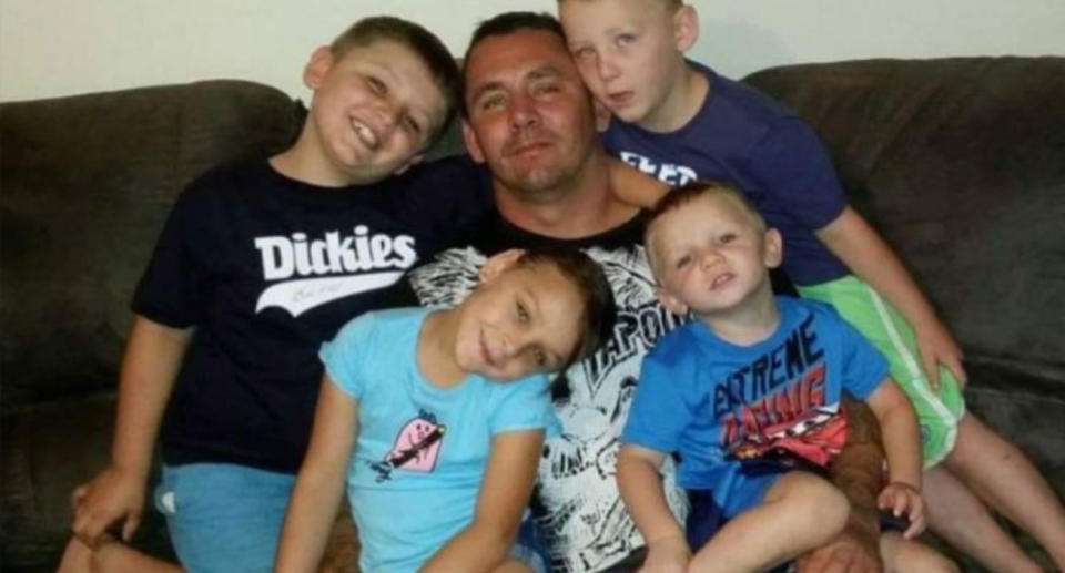 Pictured is Mark Keans, the 39-year-old father with terminal cancer and his four children. His family was initially told by Queensland authorities only one of his children, from Sydney, would be allowed to visit him in hospital.