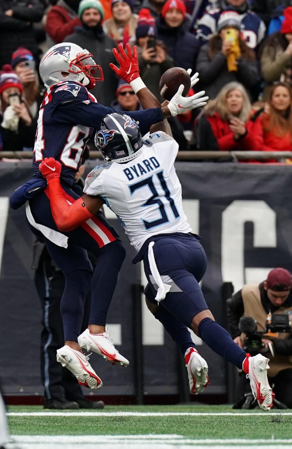 New England Patriots wide receiver Kendrick Bourne makes a touchdown catch against Tennessee Titans free safety Kevin Byard  in the first quarter at Gillette Stadium in Foxboro on Nov. 28, 2021.