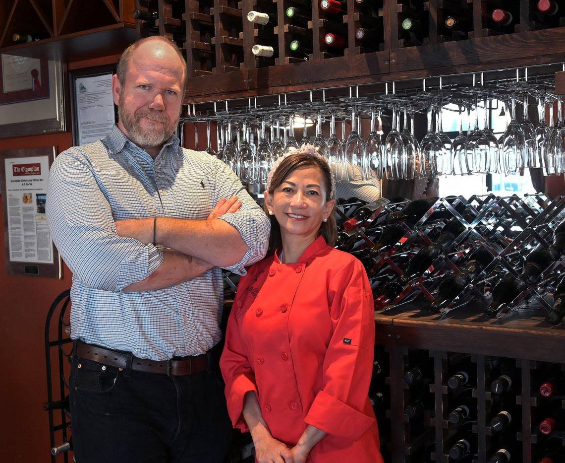 Chef Laurie Nguyen, right, will sell Olympia’s Dockside Bistro & Wine Bar to Will Edwards, her current floor manager and sommelier. “It is a destination for people to celebrate, and I’m really proud of what we did,” she said, “but I think it’s time for somebody to take over.”