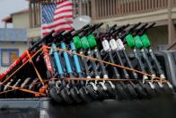 Truckload of scooters are shown stacked in a Scoot Scoop truck after the company impounded the devices after they were left on private property in San Diego, California