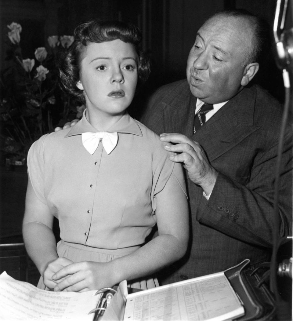 Pat Hitchcock with her father on set in 1950 during filming of Strangers on a Train based on the novel by Patricia Highsmith - Alamy
