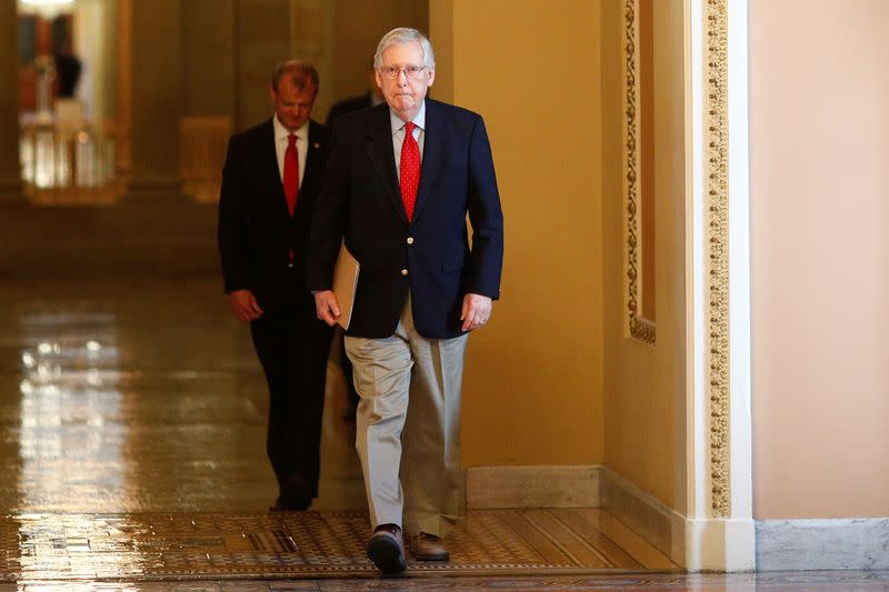 Senate Majority Leader McConnell speaks to members of the news media after departing from the Senate Chamber floor on Capitol Hill in Washington