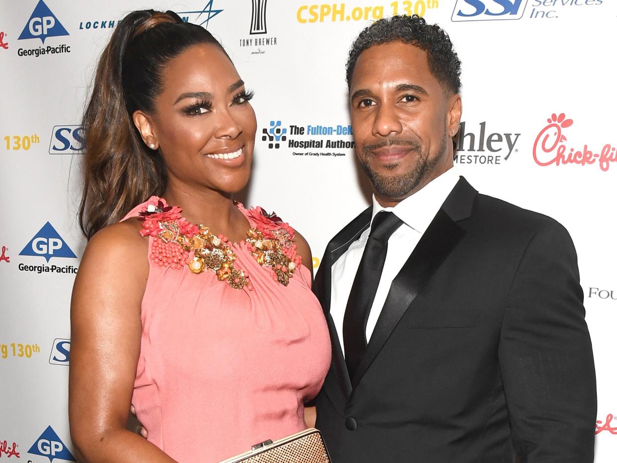 Kenya Moore and Marc Daly attend Carrie Steele-Pitts Home 130th Anniversary Gala at Four Seasons Hotel on March 24, 2018 in Atlanta, Georgia