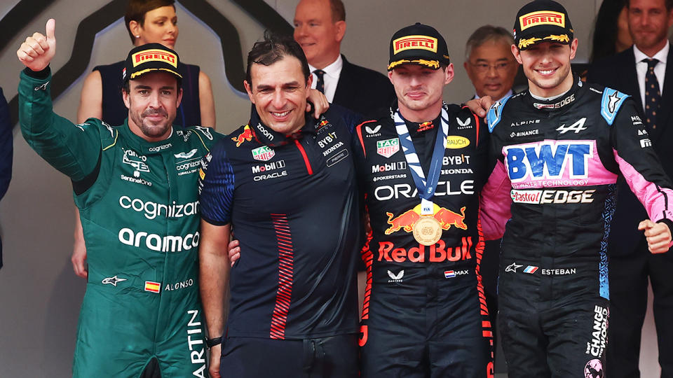 Fernando Alonso, Max Verstappen and Esteban Ocon are pictured on the F1 podium after the Monaco GP.