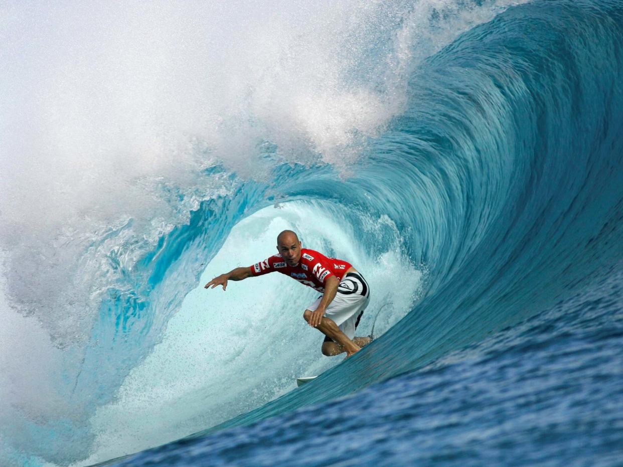 Surfing great Kelly Slater pictured at the legendary Teahupo'o beach in Tahiti: Reuters