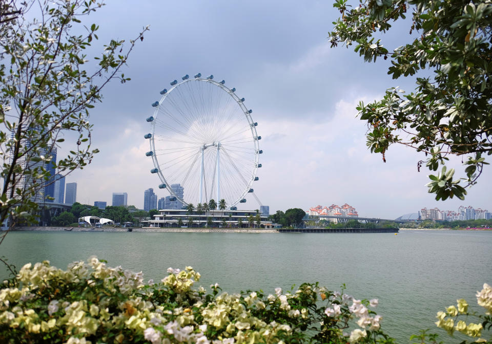 A view of the Singapore Flyer observation wheel and the waters of Marina Reservoir, in Marina Bay, Singapore March 22, 2019. Picture taken March 22, 2019. REUTERS/Kevin Lam