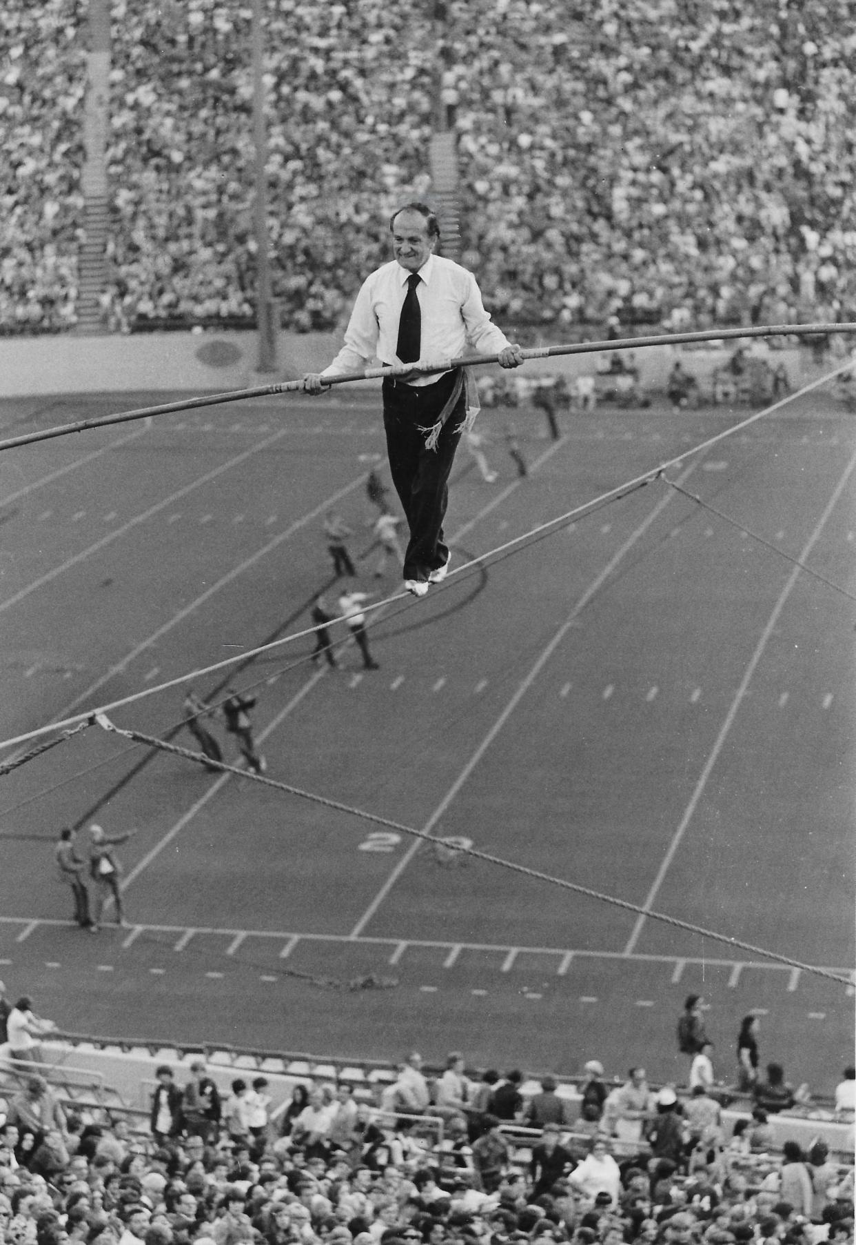 Karl Wallenda walks a tightrope across the Akron Rubber Bowl on Sept. 15, 1973.