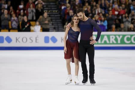 Figure Skating - ISU World Figure Skating Championships - Ice Dance Free Dance - Boston, Massachusetts, United States - 31/03/16 - Gold medalists Gabriella Papadakis and Guillaume Cizeron of France react after competing. REUTERS/Brian Snyder