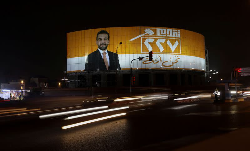 An election poster shows Iraqi speaker of Parliament Mohammed Halbousi, in Baghdad