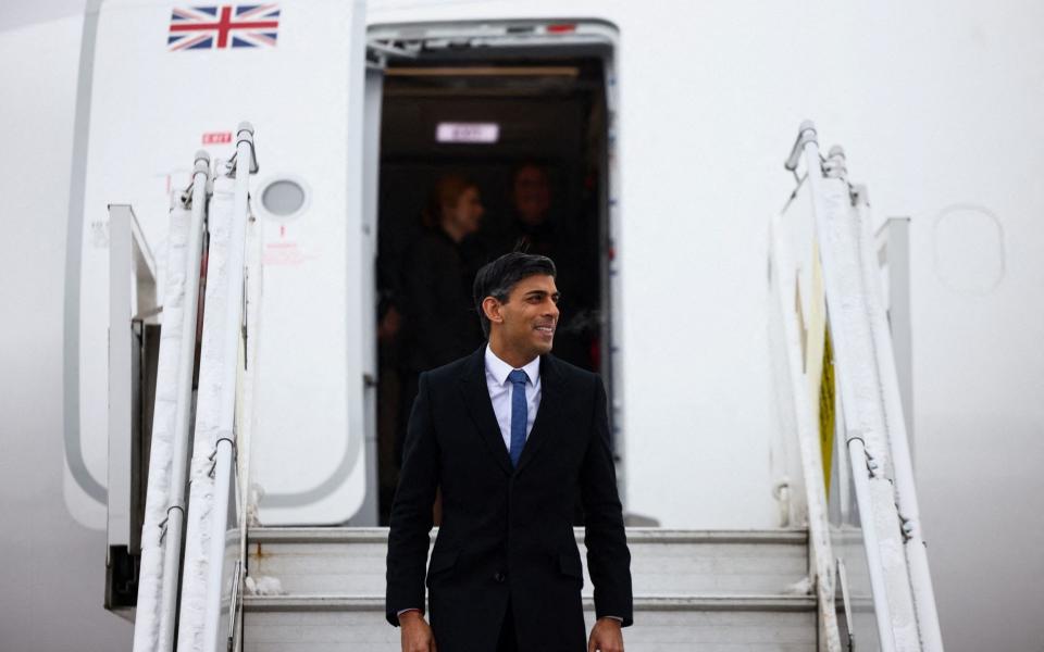 British Prime Minister Rishi Sunak disembarks a plane at Riga International Airport, in Latvia December 19, 2022 - POOL/AFP via Getty Images