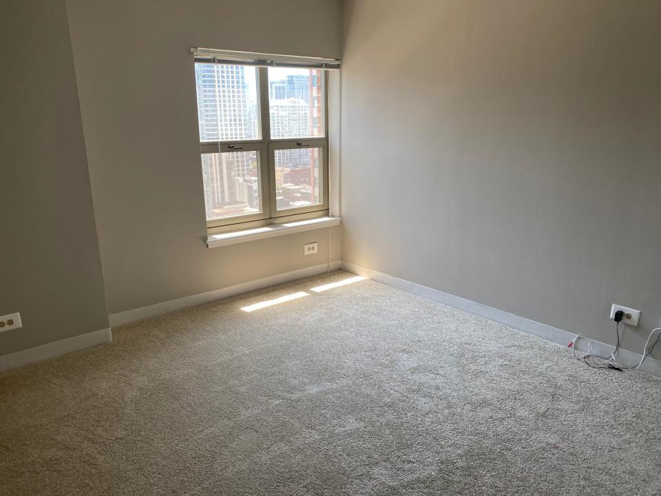 the bedroom with carpet at 100 w chestnut