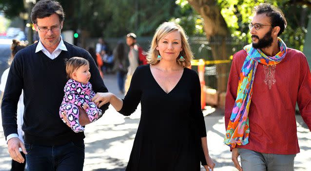 Greens Senator Waters arrives with her partner Jeremy Gates (left) and their daughter Alia Joy, flanked by Greens Brisbane City Councillor Jonathan Sri, to announces her resignation. Source: AAP