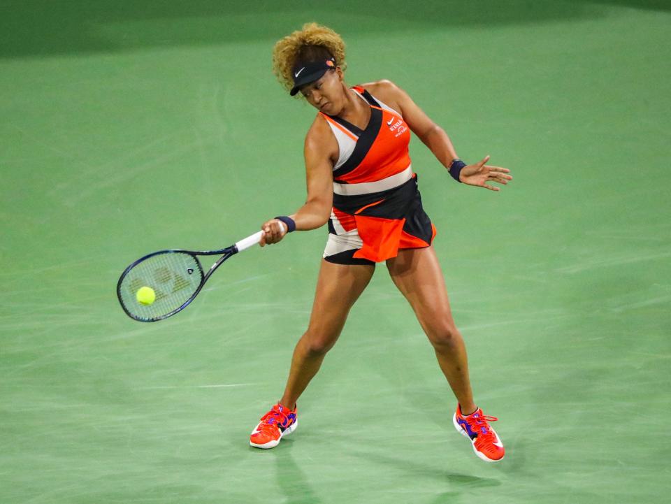 Naomi Osaka of Japan connects a shot to Veronika Kudermetova of Russia during the second round of the BNP Paribas Open at the Indian Wells Tennis Garden in Indian Wells, California on Saturday, March 12, 2022. 