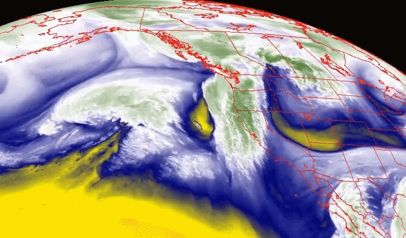 NOAA's GOESWest  monitored water vapor on Jan. 30, showing a plume of moisture (green/white), moving over the Pacific Northwest. The second storm that approached the West Coast this week was expected to be even more robust.  / Credit: NOAA