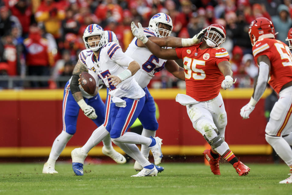 KANSAS CITY, MISSOURI - DECEMBER 10: Josh Allen #17 of the Buffalo Bills carries the ball during the first half of the game against the Kansas City Chiefs at GEHA Field at Arrowhead Stadium on December 10, 2023 in Kansas City, Missouri. (Photo by Jamie Squire/Getty Images)
