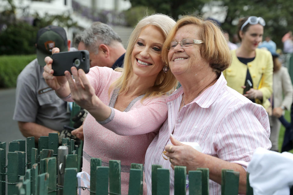 White House counselor to the president Kellyanne Conway poses for a selfie with a supporter.