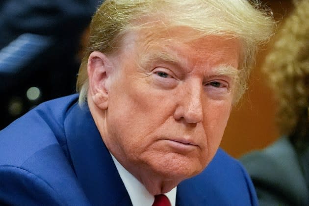 Donald Trump attends a hearing to determine the date of his trial for allegedly covering up hush money payments linked to extramarital affairs, at Manhattan Criminal Court in New York City on March 25, 2024. - Credit: Mary Altaffer/POOL/AFP/Getty Images