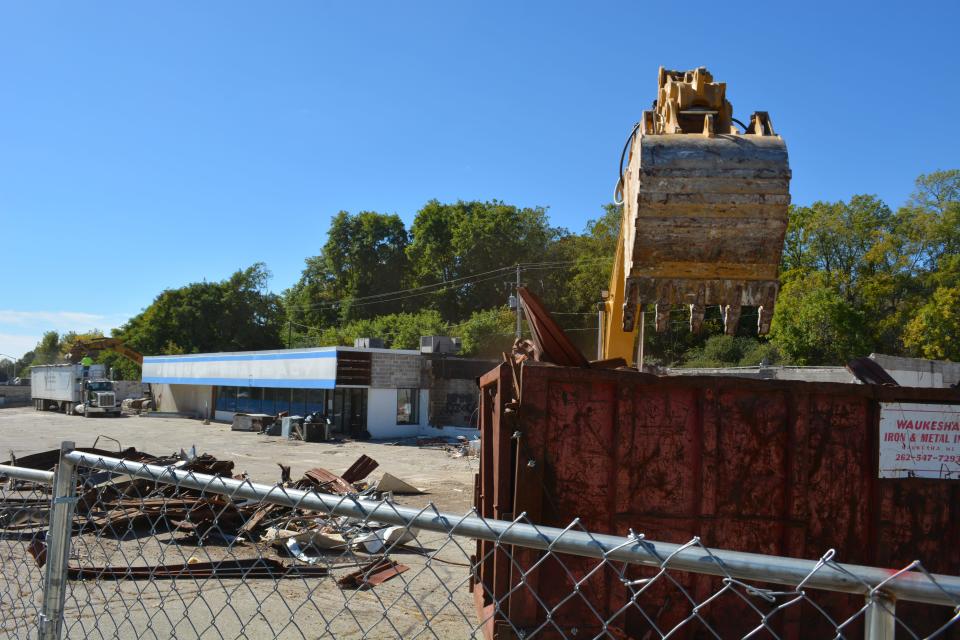 Little remains of the old strip mall on Oct. 4, 2018, after demolition crews work on tearing down the old building on Delafield Street in Waukesha. Though the center had become an eyesore in recent years, city officials it is set on a prime piece of property, which has drawn significant developer interest.