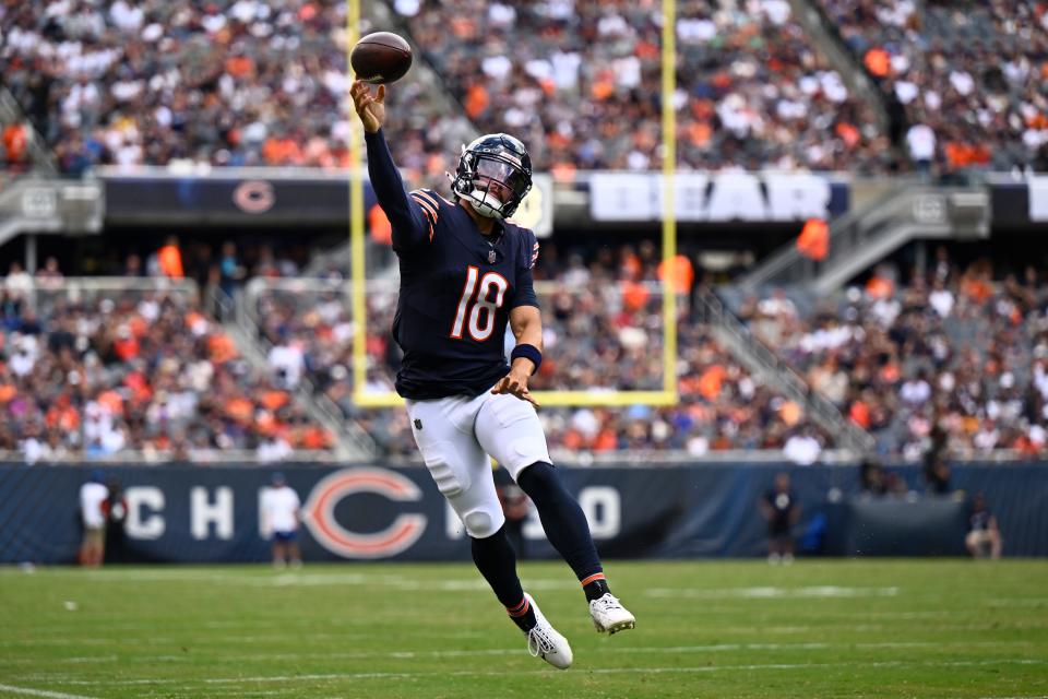 CHICAGO, ILLINOIS - AUGUST 17: Caleb Williams #18 of the Chicago Bears passes in the first half of a preseason game against the Cincinnati Bengals at Soldier Field on August 17, 2024 in Chicago, Illinois. (Photo by Quinn Harris/Getty Images)