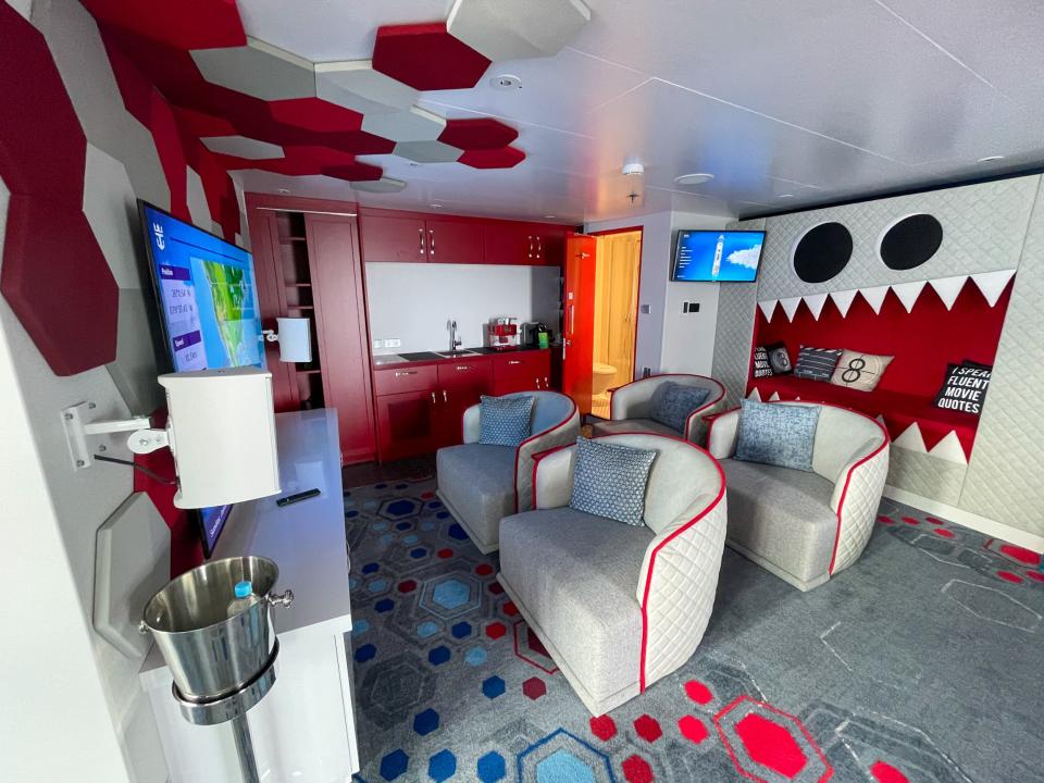 Ultimate Family Townhouse's movie room with seating, tvs, a monster day bed
