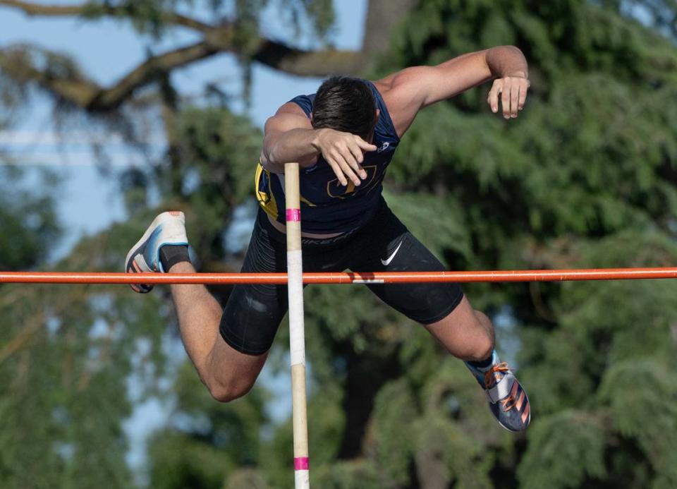 Turlock vaulter Maxwell McFarlane clears 14-10.00 to win the boys pole vault in the Central California Athletic League Championships at Downey High School in Modesto, Calif., Wednesday, May 1, 2024.