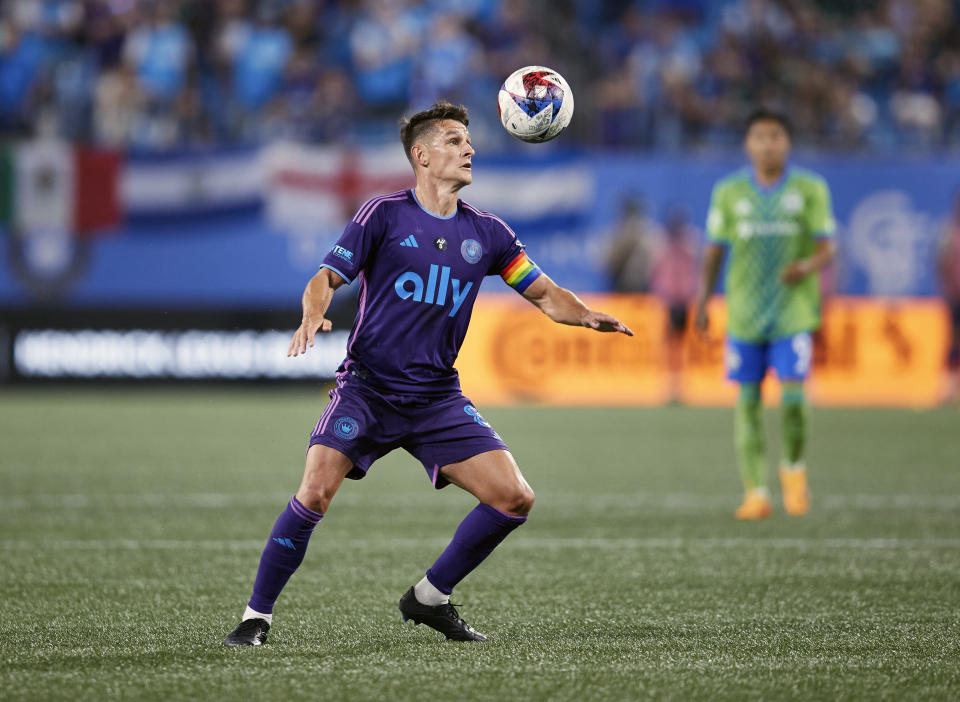 Charlotte FC midfielder Ashley Westwood (8) controls the ball out of the air during an MLS soccer match against the Seattle Sounders, Saturday, June 10, 2023, in Charlotte, N.C. (AP Photo/Brian Westerholt)