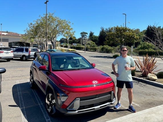 The 2024 Hyundai Kona Limited parked in a suburban small in California.