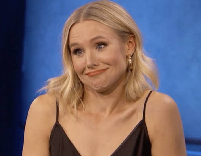 Kristen Bell shrugging