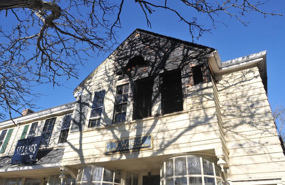 A fire broke out Monday evening in the block of mixed-use buildings at 172-176 Main St. in downtown Falmouth, leaving three people injured, including two residents and a firefighter, authorities said Tuesday morning. The cause of the fire remained under investigation Tuesday.