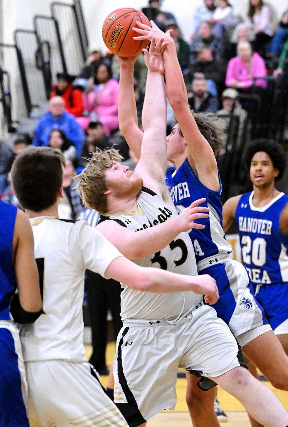 Western Wayne senior Kyle Guarino (35) battles for a rebound in a non-league game versus Hanover Area at the venerable Varden Garden.