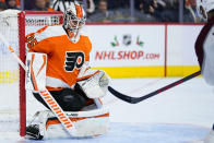 Philadelphia Flyers' Martin Jones, left, cannot stop a goal by Colorado Avalanche's Nazem Kadri during the third period of an NHL hockey game, Monday, Dec. 6, 2021, in Philadelphia. (AP Photo/Matt Slocum)