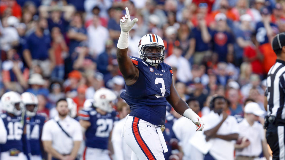 Auburn defensive end Marlon Davidson (3) celebrates a stop against Alabama during an NCAA college football game Saturday, Nov. 30, 2019, in Auburn, Ala. (AP Photo/Butch Dill)