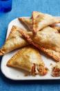 <p>Take your turkey leftovers and turn them into a spicy snack.</p><p><strong><a href="https://www.womansday.com/food-recipes/food-drinks/recipes/a52072/turkey-turnovers-with-apricots-and-almonds/" rel="nofollow noopener" target="_blank" data-ylk="slk:Get the recipe.;elm:context_link;itc:0;sec:content-canvas" class="link ">Get the recipe.</a></strong></p>