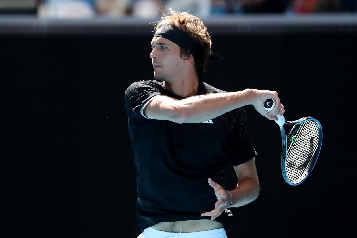 MELBOURNE, AUSTRALIA - JANUARY 19: Alexander Zverev of Germany plays a forehand in their round two singles match against Michael Mmoh of the United States during day four of the 2023 Australian Open at Melbourne Park on January 19, 2023 in Melbourne, Australia. (Photo by Kelly Defina/Getty Images)