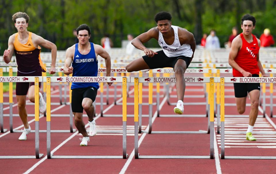 Bloomington South’s D’Andre Black competes in the boys' 110 meter hurdles during the Conference Indiana track meet at Bloomington North on Friday, April 26, 2024.